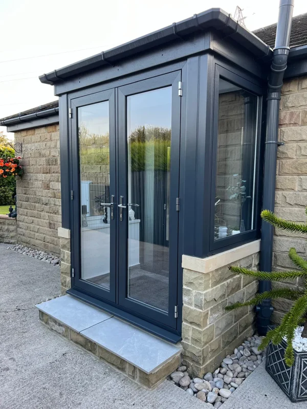 Modern porch extension with energy efficient windows and door