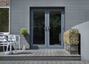 French doors with grey frames and decking