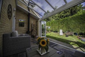 internal view of lean-to conservatories Yorkshire with bifold doors and sofa